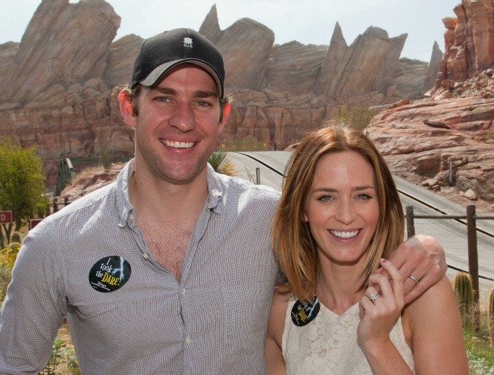 (July 27, 2012) Actors Emily Blunt and John Krasinski pose at the all-new Cars Land in Disney California Adventure park in Anaheim, Calif., on Friday. Cars Land and its three family attractions recreate the town of Radiator Springs from the Disney-Pixar film, ‘Cars.’ (Paul Hiffmeyer/Disney)